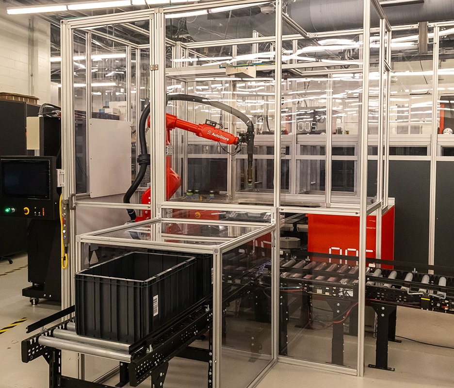 Abstract render evoking a grid of totes in an automated picking cell